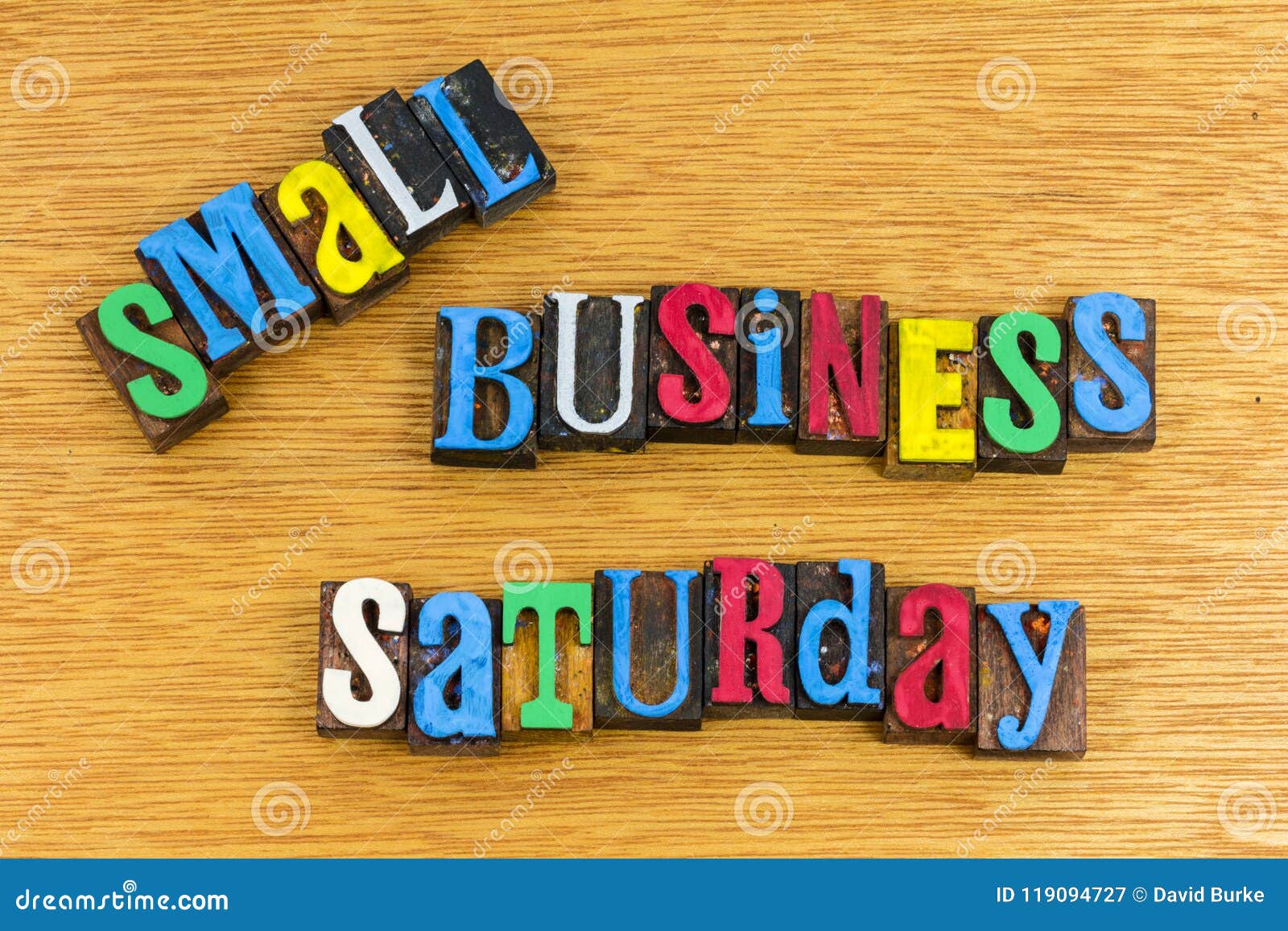 small retail business owner saturday sales sign local sale
