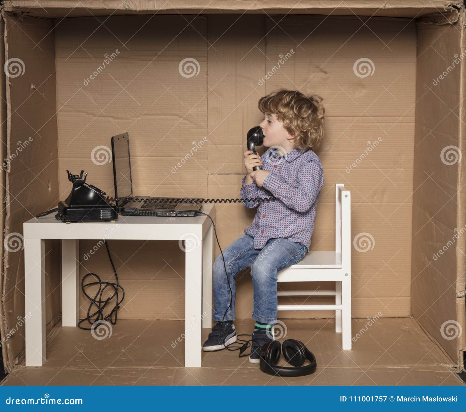small businessman yells into the headphones