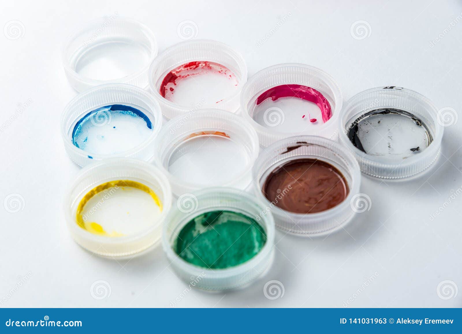 Small Cans of Colorful Gouache Paint on the Whole Frame Stock Image