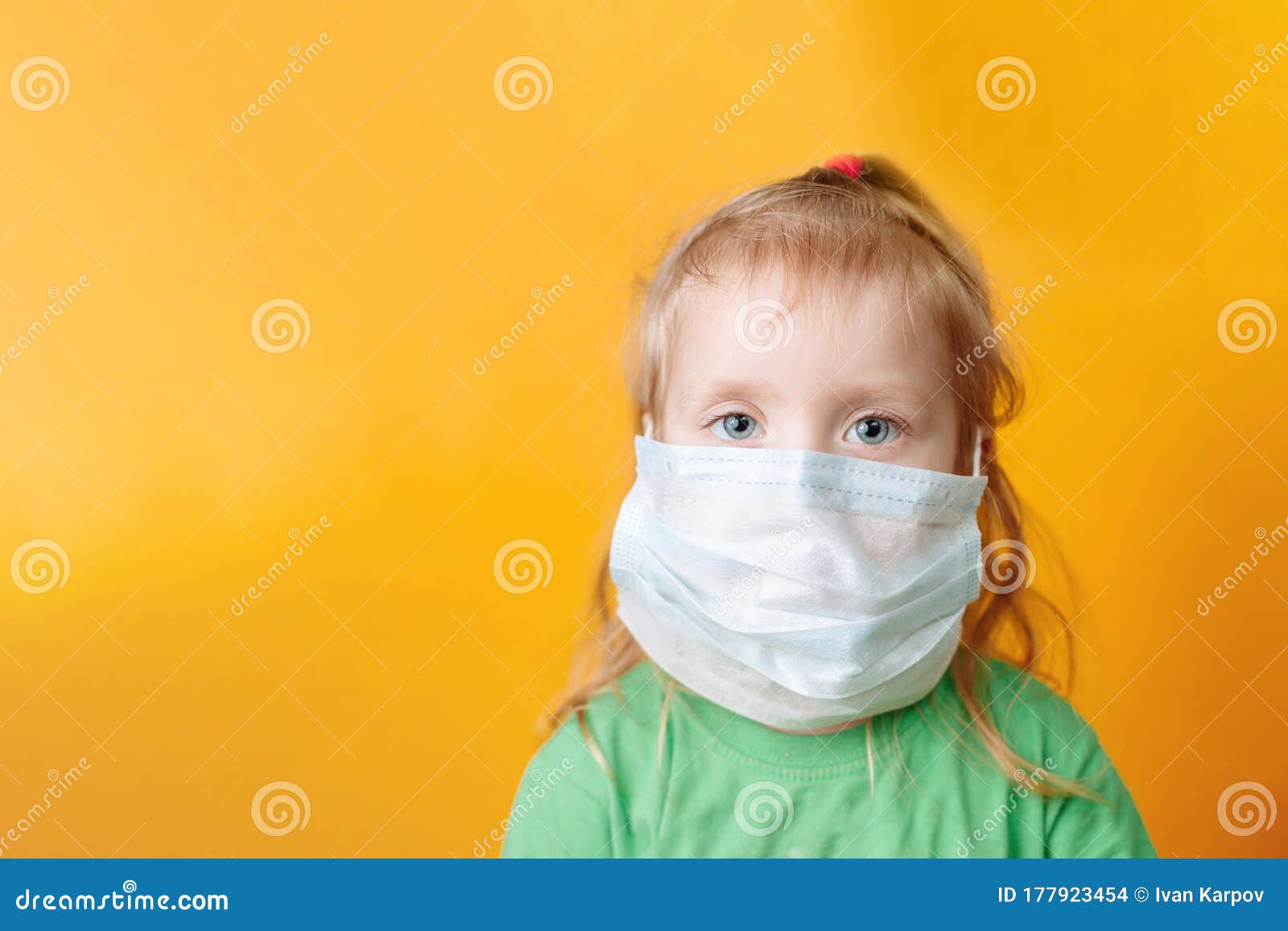 Download A Small Child In A Medical Mask On A Yellow Background Stock Photo Image Of Girl Covid19 177923454 PSD Mockup Templates