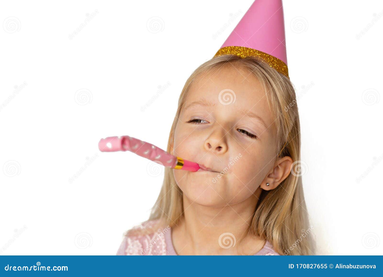 Download Small Child In Pink Hat Blowing In Birthday Pipe On White ...