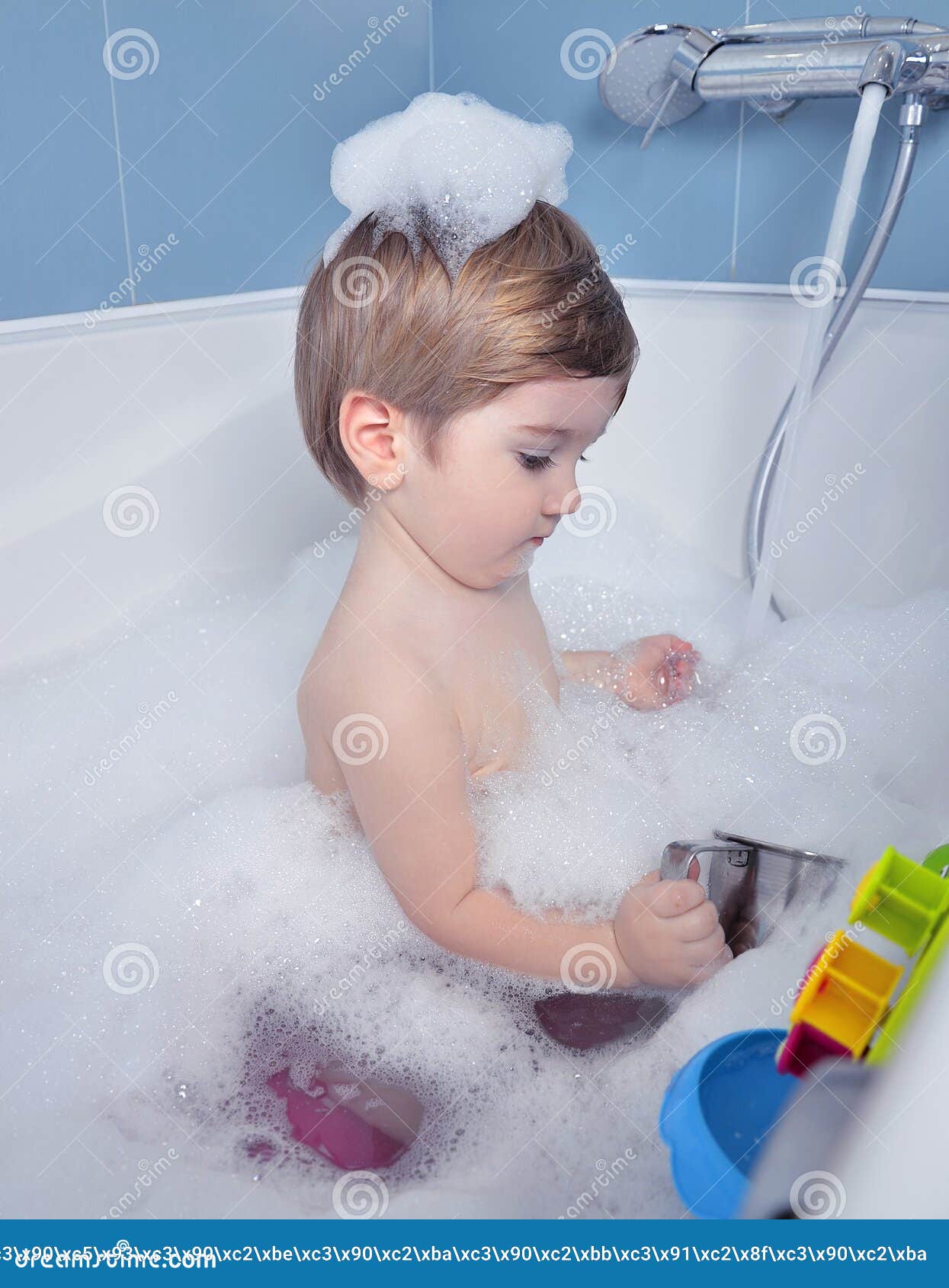 Small child takes a bath stock photo. Image of little 85960680