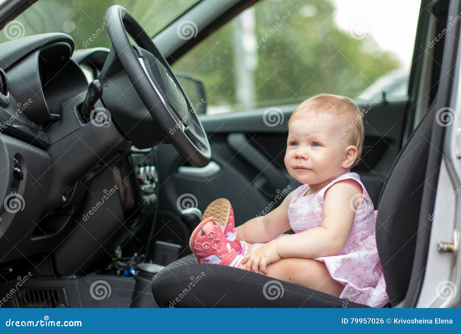 Small cute baby in a car stock photo. Image of seat, summer 79957026