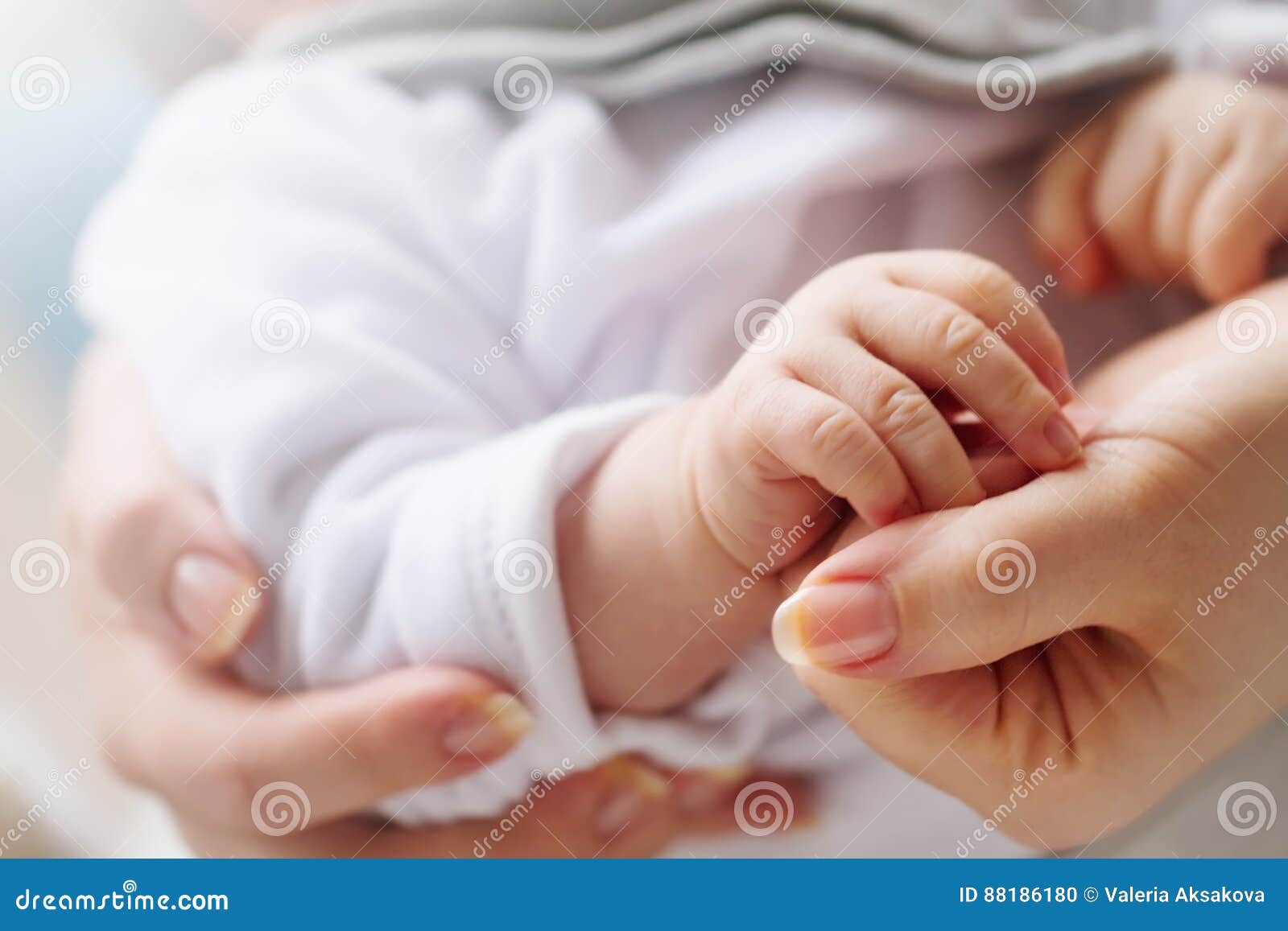 Small Cute Baby Hand in Mothers Hand. Closeup. Concept of ...