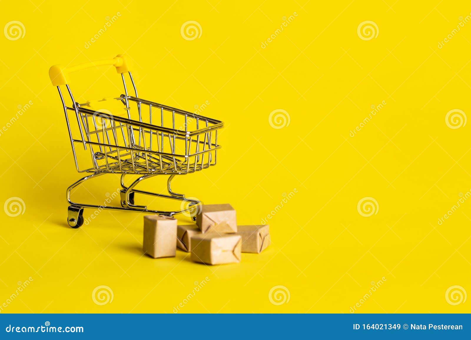 Download Small Decorative Trolley With Boxes On Yellow Background High Resolution Shop Sales Black Friday Concept Stock Image Image Of Packaging Object 164021349 Yellowimages Mockups