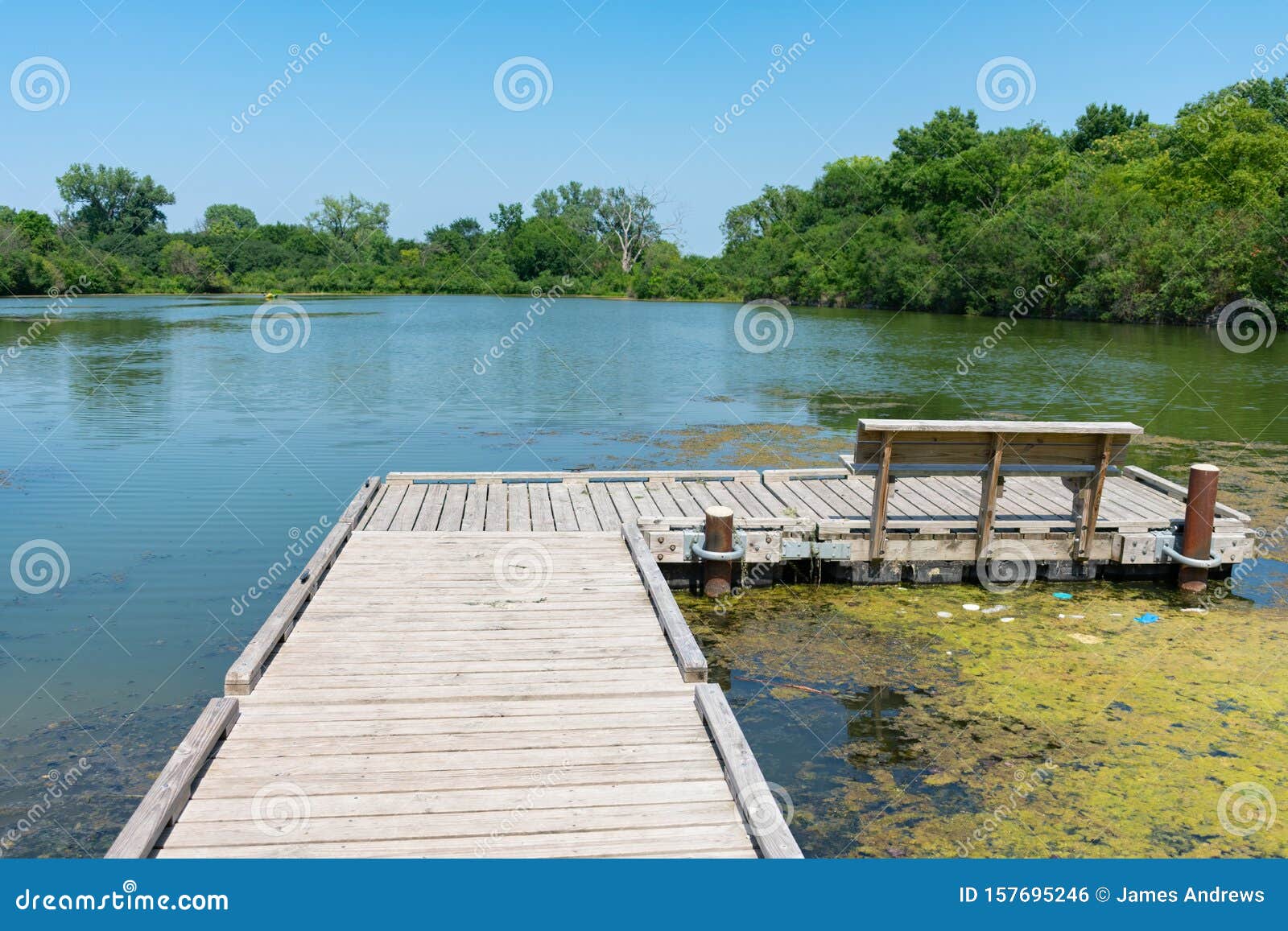Small Dock with a Bench on a Water Filled Quarry in Lemont Illinois