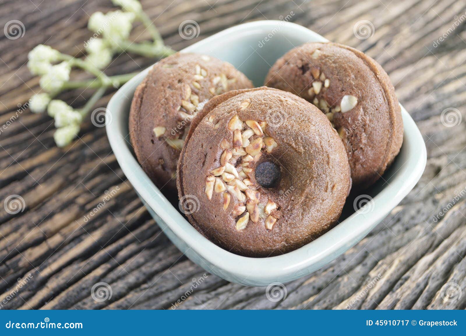 Small donut in a bowl stock image. Image of round, bean 45910717