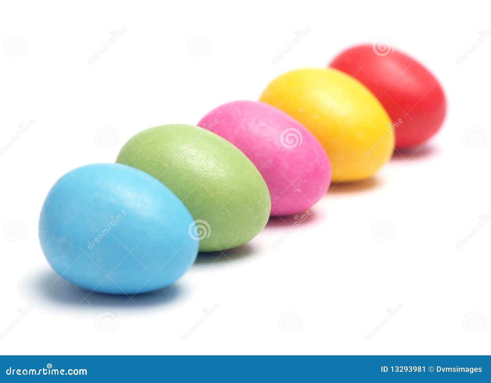 Small Easter Eggs Row stock image. Image of confectionery 13293981