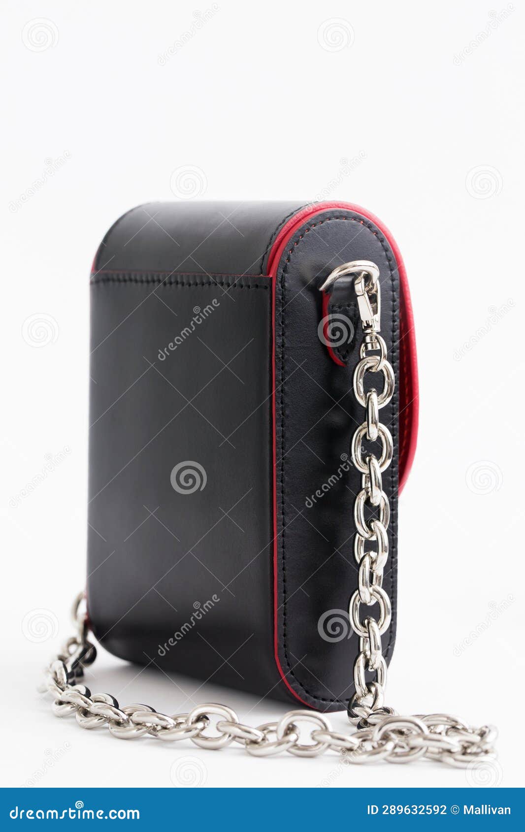 Small Elegant Black Bag with Red Inserts in the Shape of a Heart and a