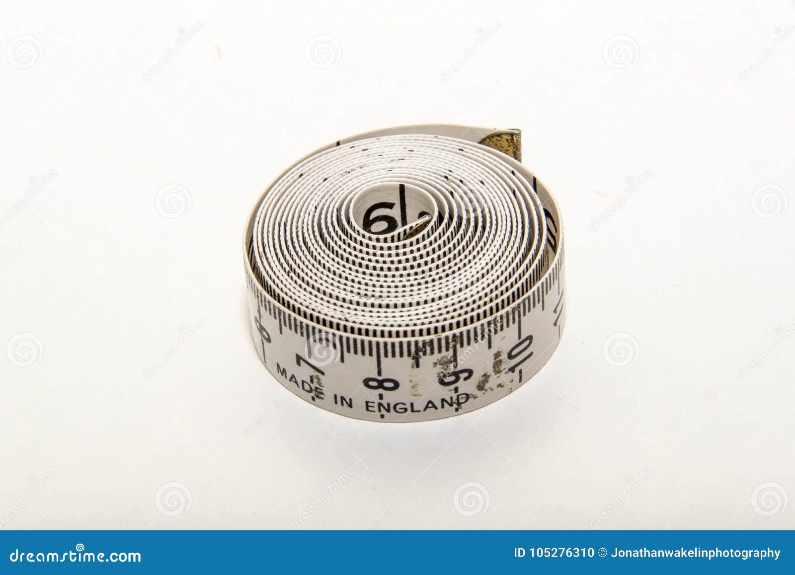 A Small Fabric Tape Measure on a White Background Stock Photo - Image of  england, white: 105276310