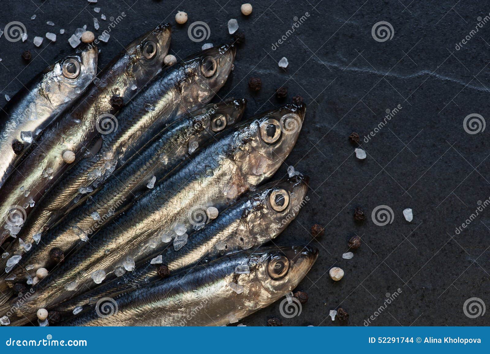Small Fishes with Salt and Pepper on the Table Stock Photo Image of