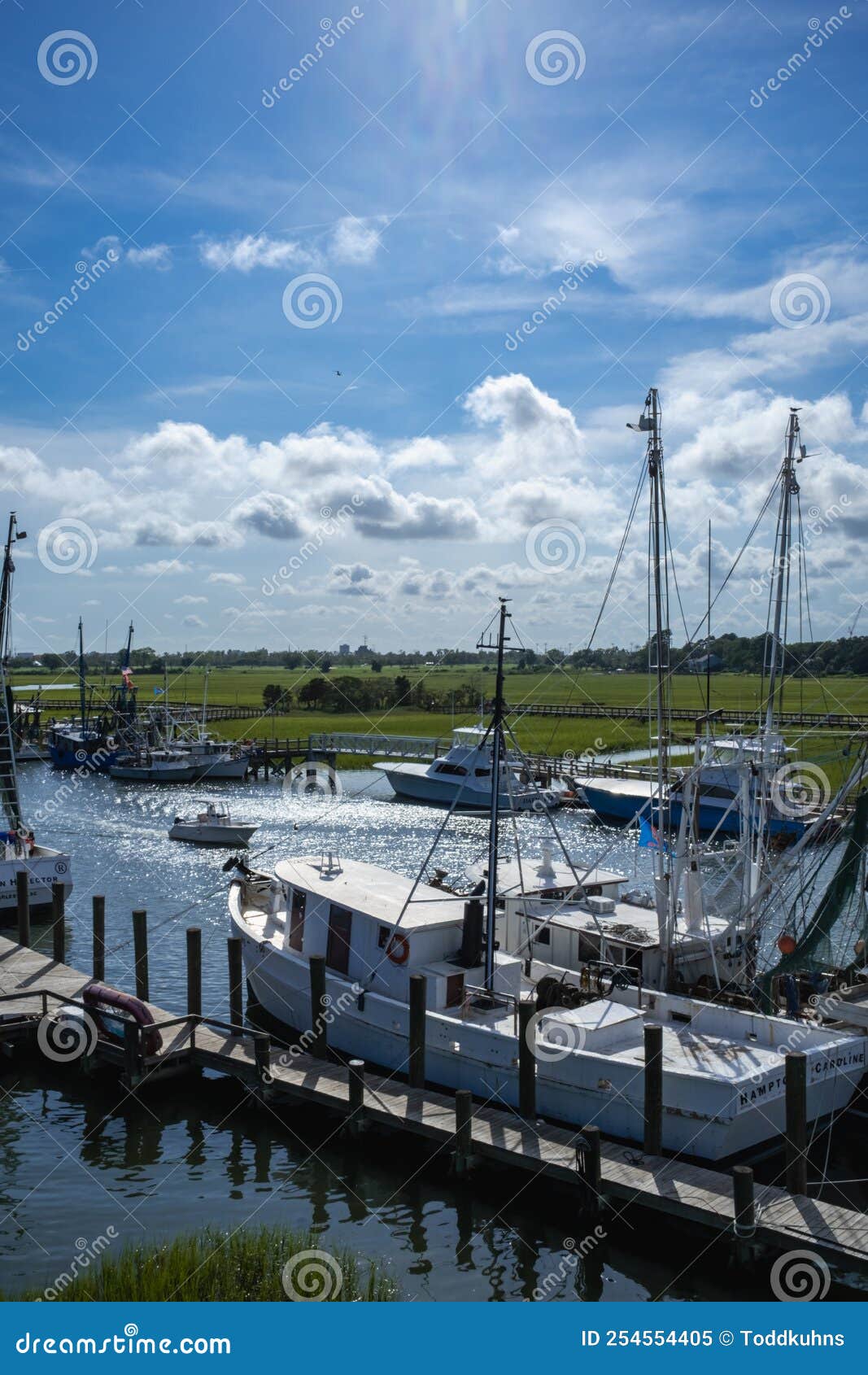 Small Fishing and Shrimp Boat Docked in Late Afternoon Sunlight Stock Image  - Image of afternoon, scene: 254554405