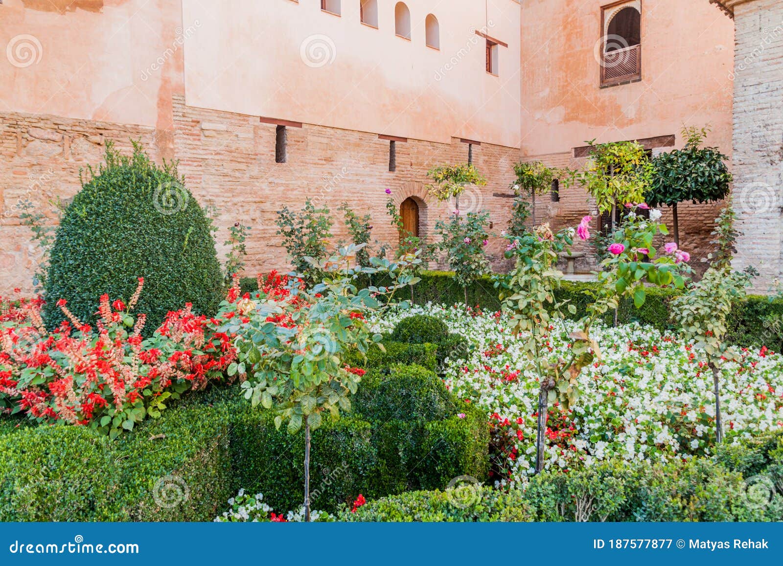 small garden at nasrid palaces (palacios nazaries) at alhambra in granada, spa