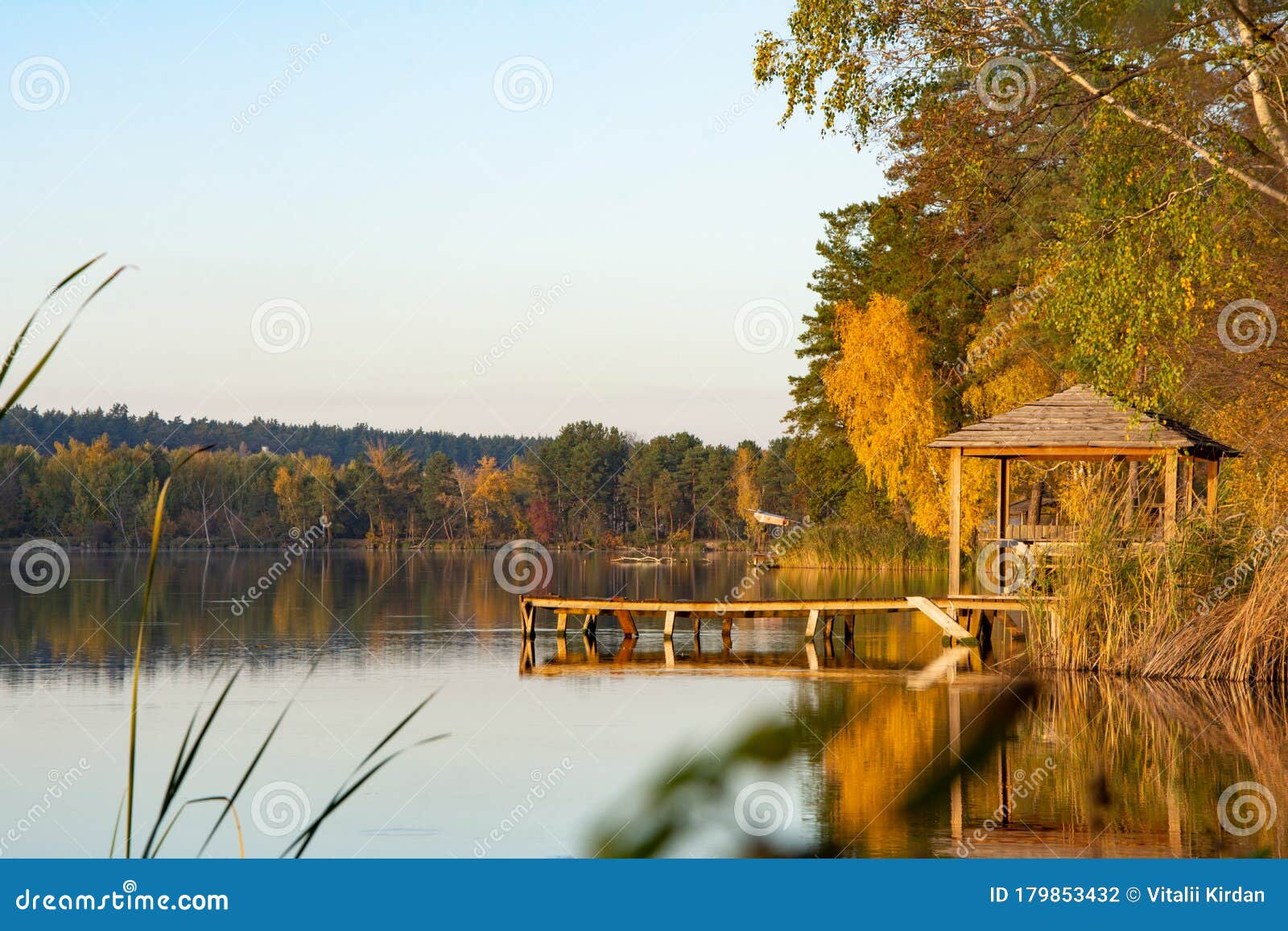 A Small Gazebo And A Pier Near The Lake For Fishing Stock A Small Gazebo And A Pier Near The Lake For Fishing Stock