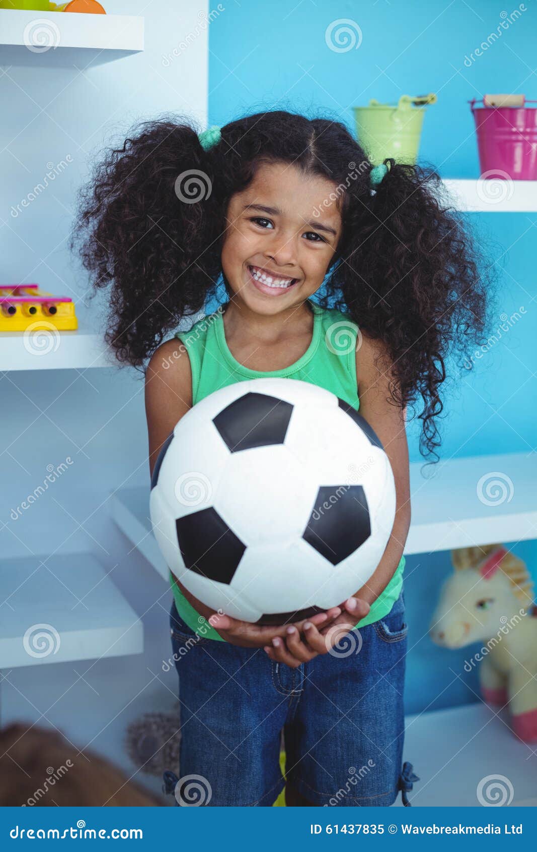 Small Girl Holding a Soccer Ball Stock Image - Image of smiling, length ...