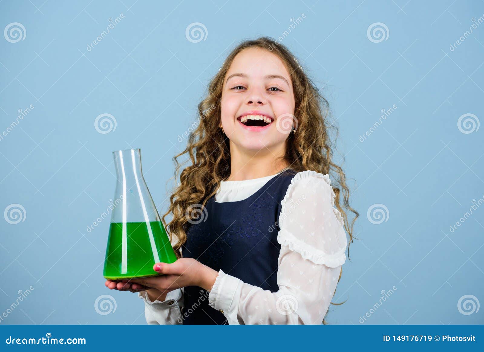 small girl scientist with testing flask. education and knowledge. child study bilogy lesson. discover future. science
