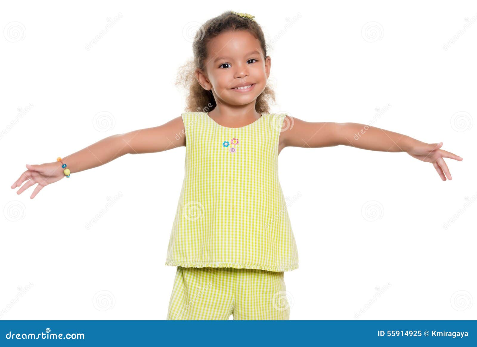 small girl smiling with her arms wide open