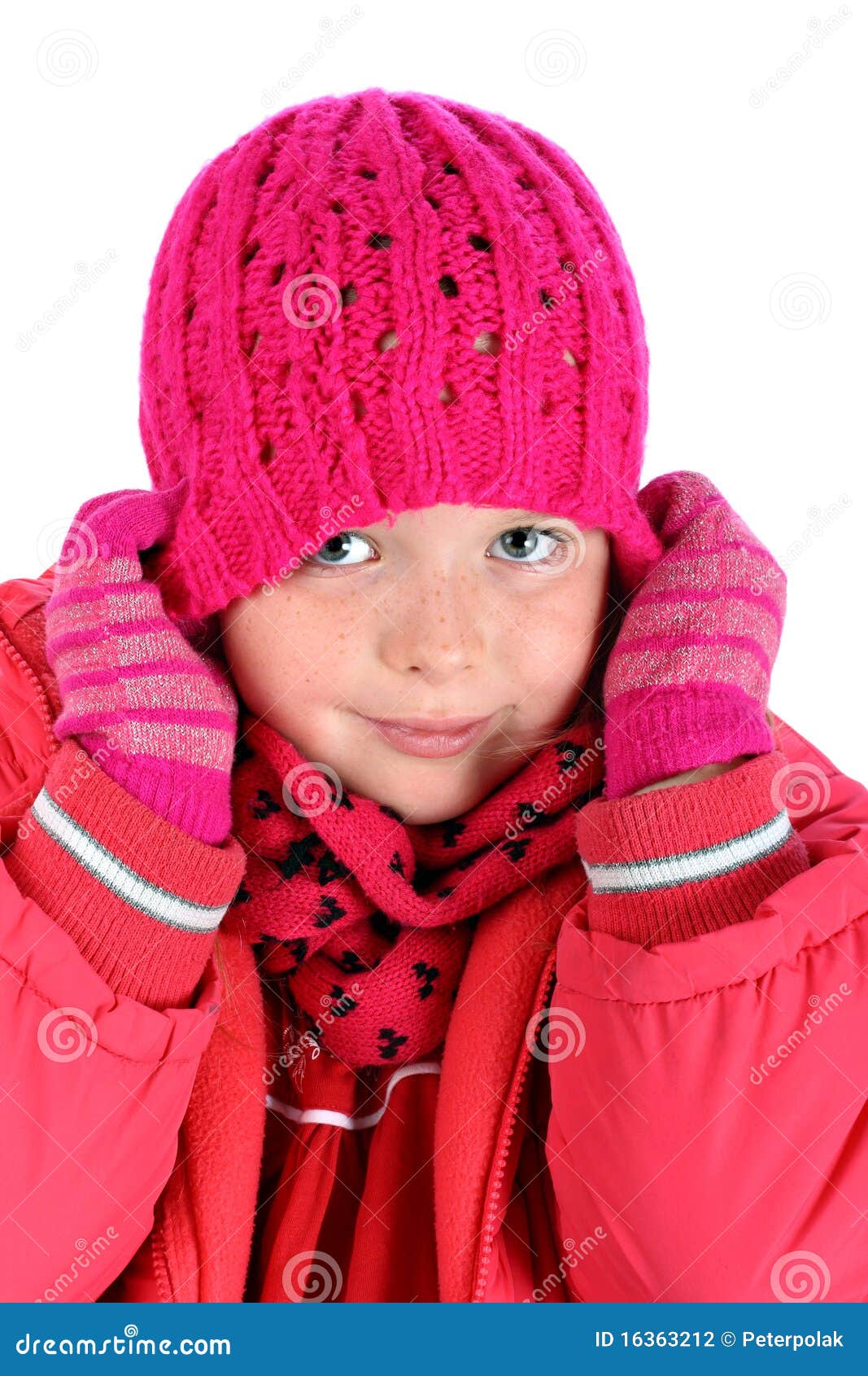 Small Girl Stretching Her Winter Cap Over White Stock Photo - Image of ...