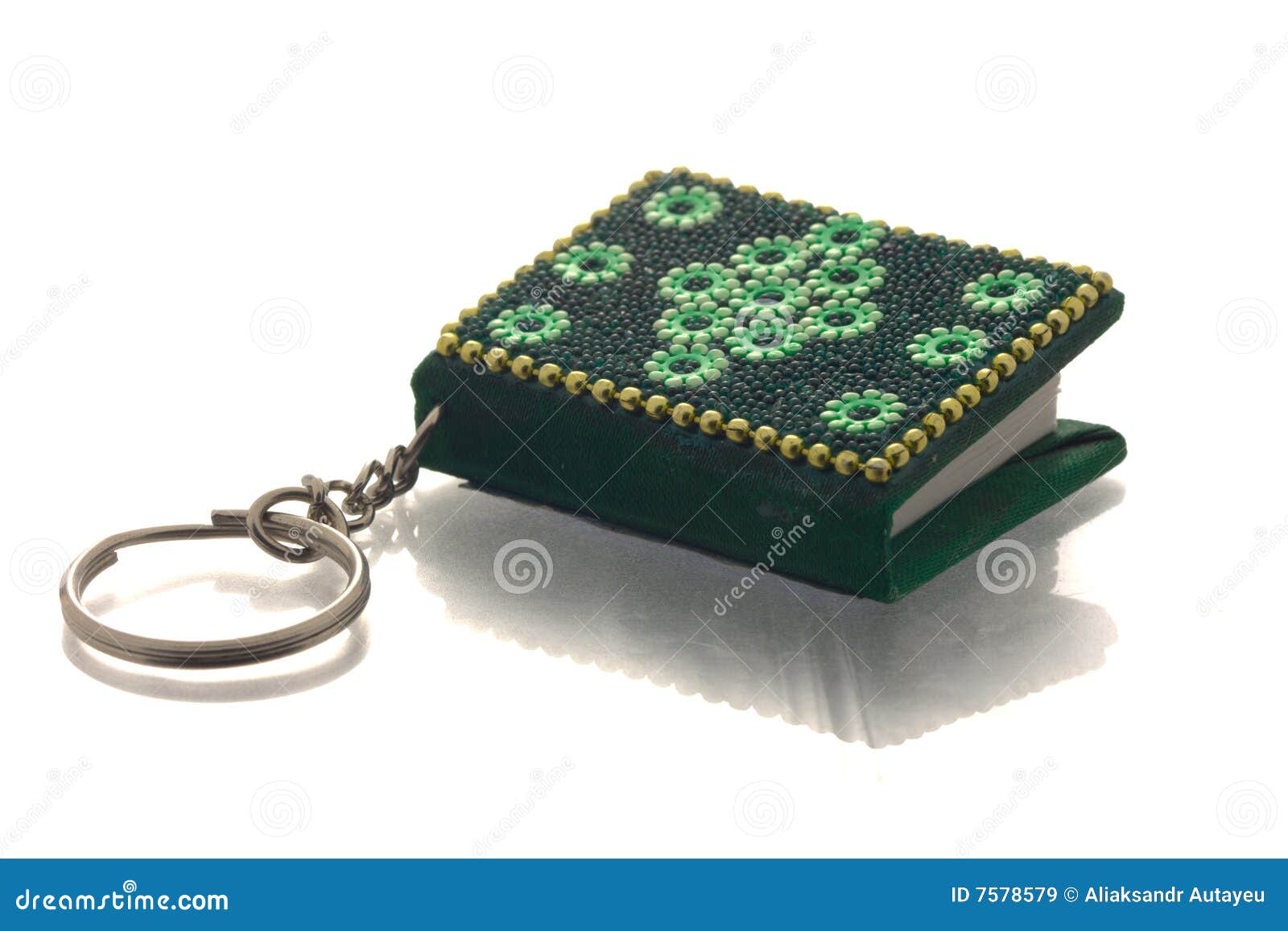 Small green keyring book stock image. Image of trinket 7578579