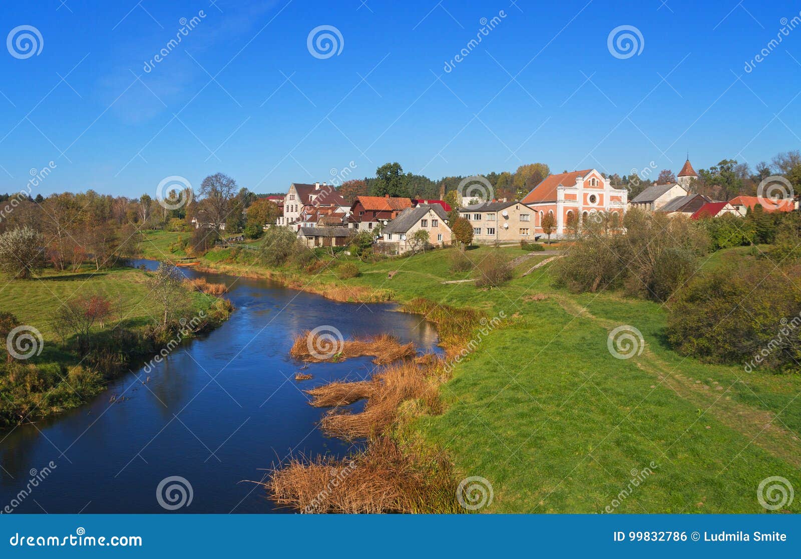 Small hamlet at the river. stock photo. Image of autumn 99832786
