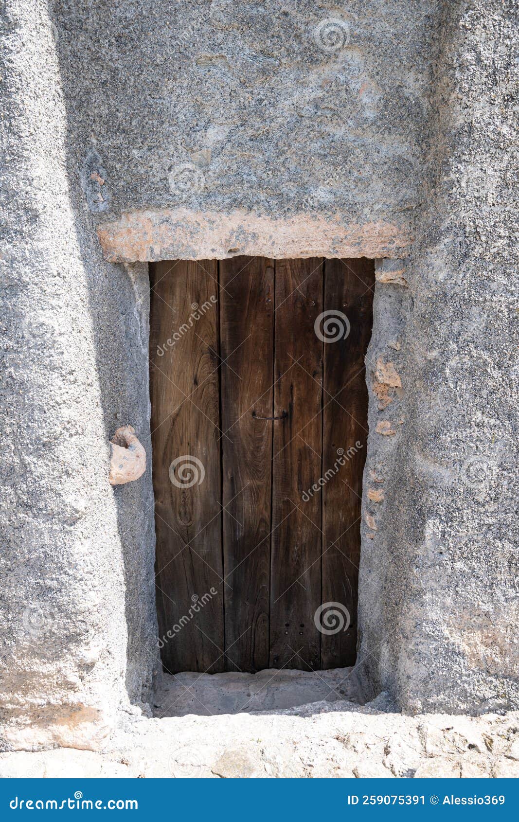 small hand-decorated wooden door