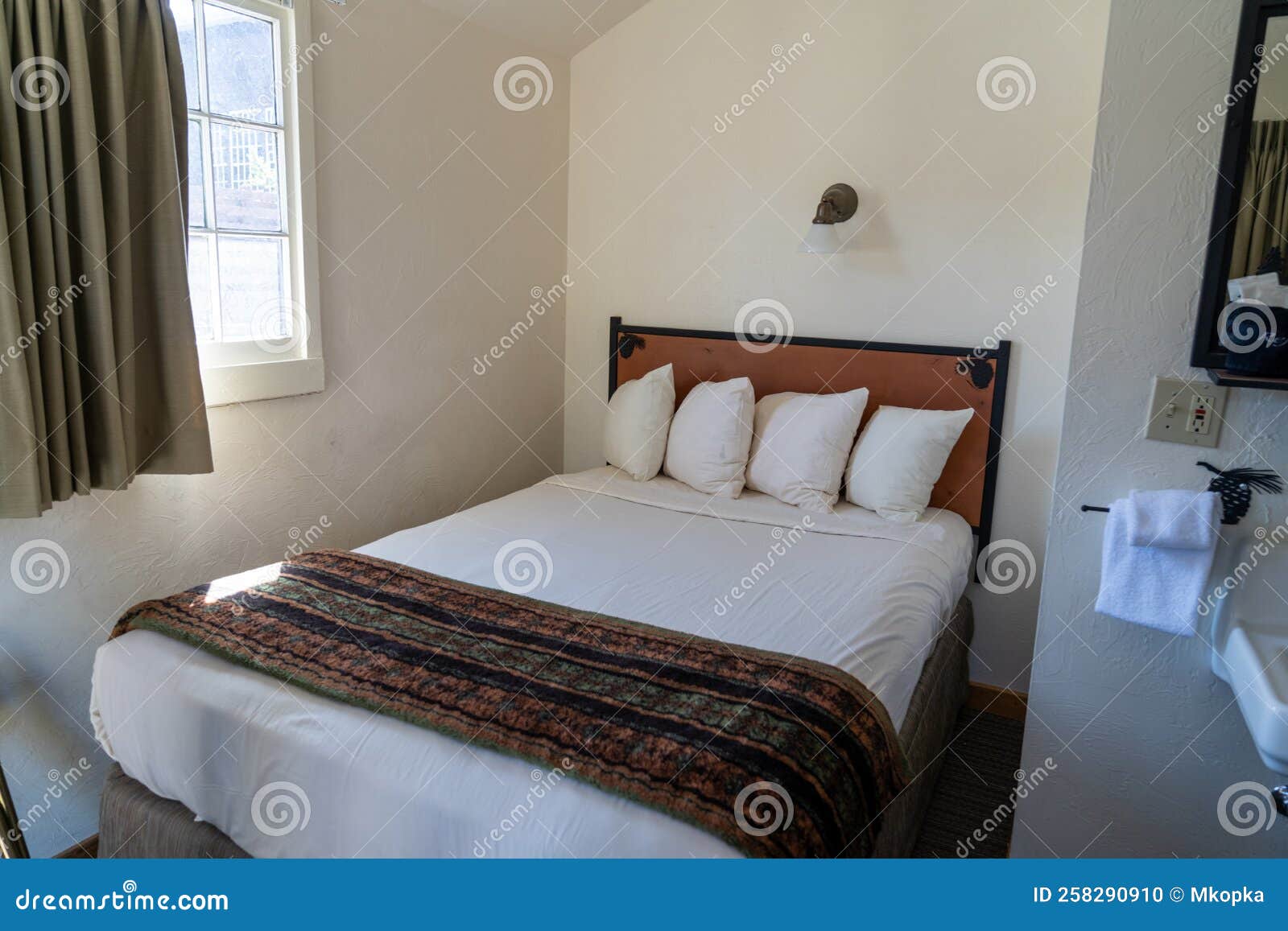 Small Hotel Room with One Double Bed, and Minimal Decor Stock Photo Image of white, clean