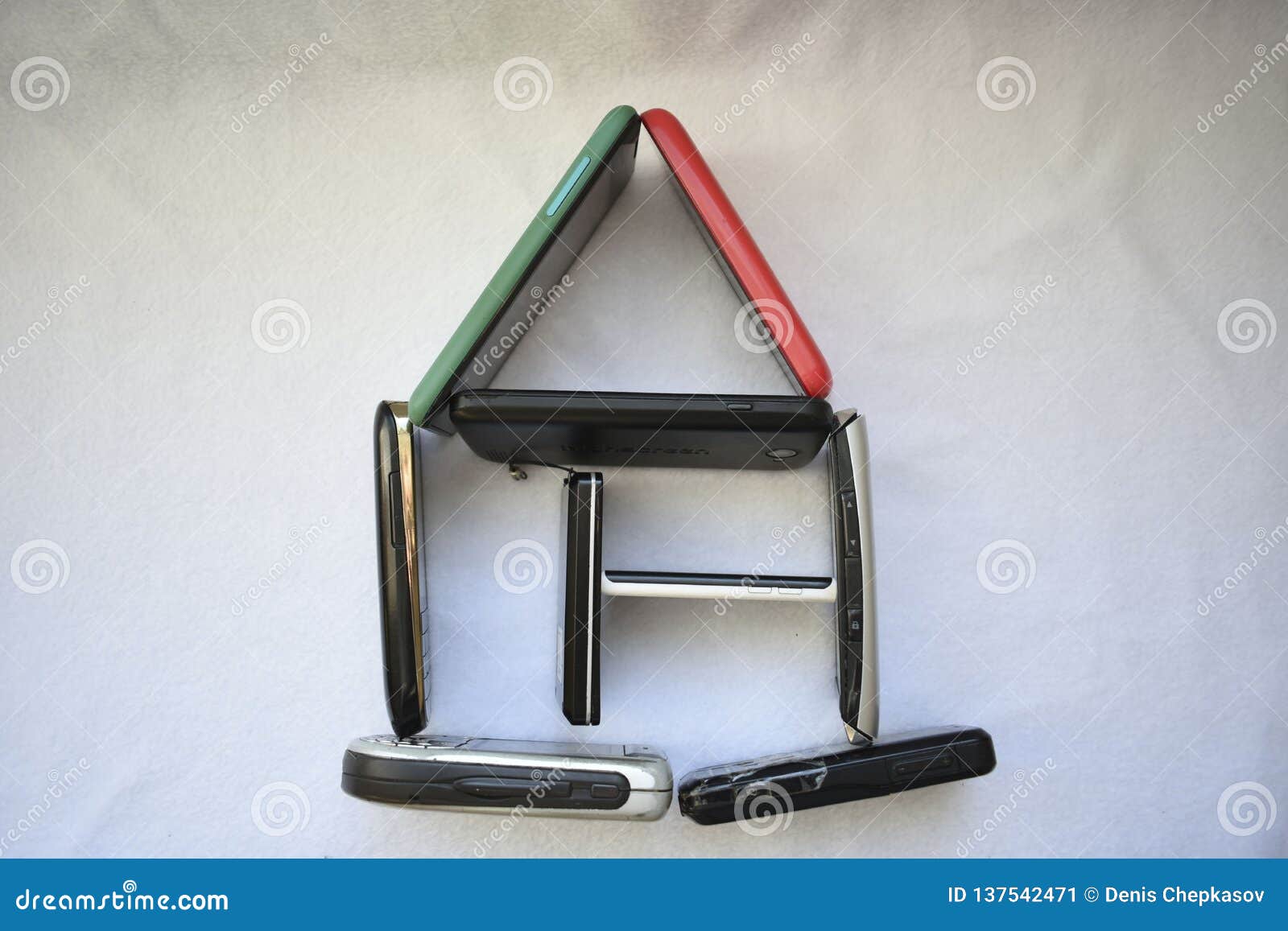 Small House of Mobile Phones. Stock Image Image of formed, name