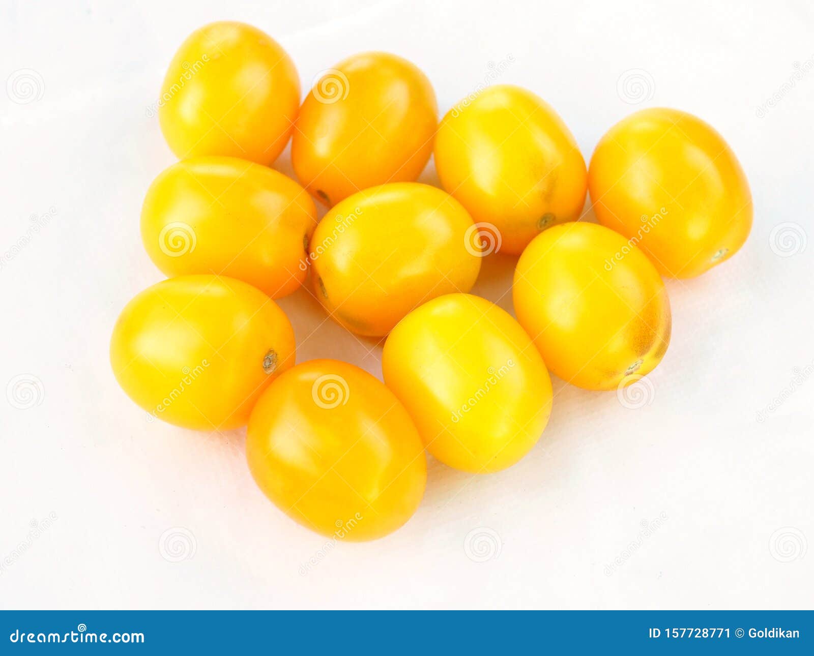 Small Identical Yellow Tomatoes on a White Background Stock Image ...