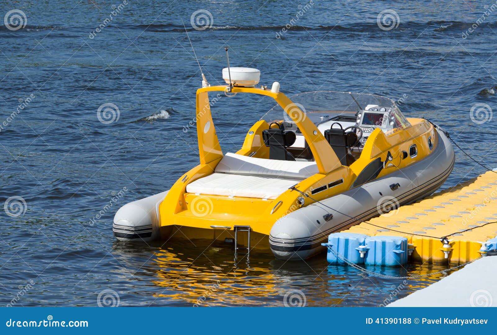 small inflatable boat with a cabin and inboard motor.