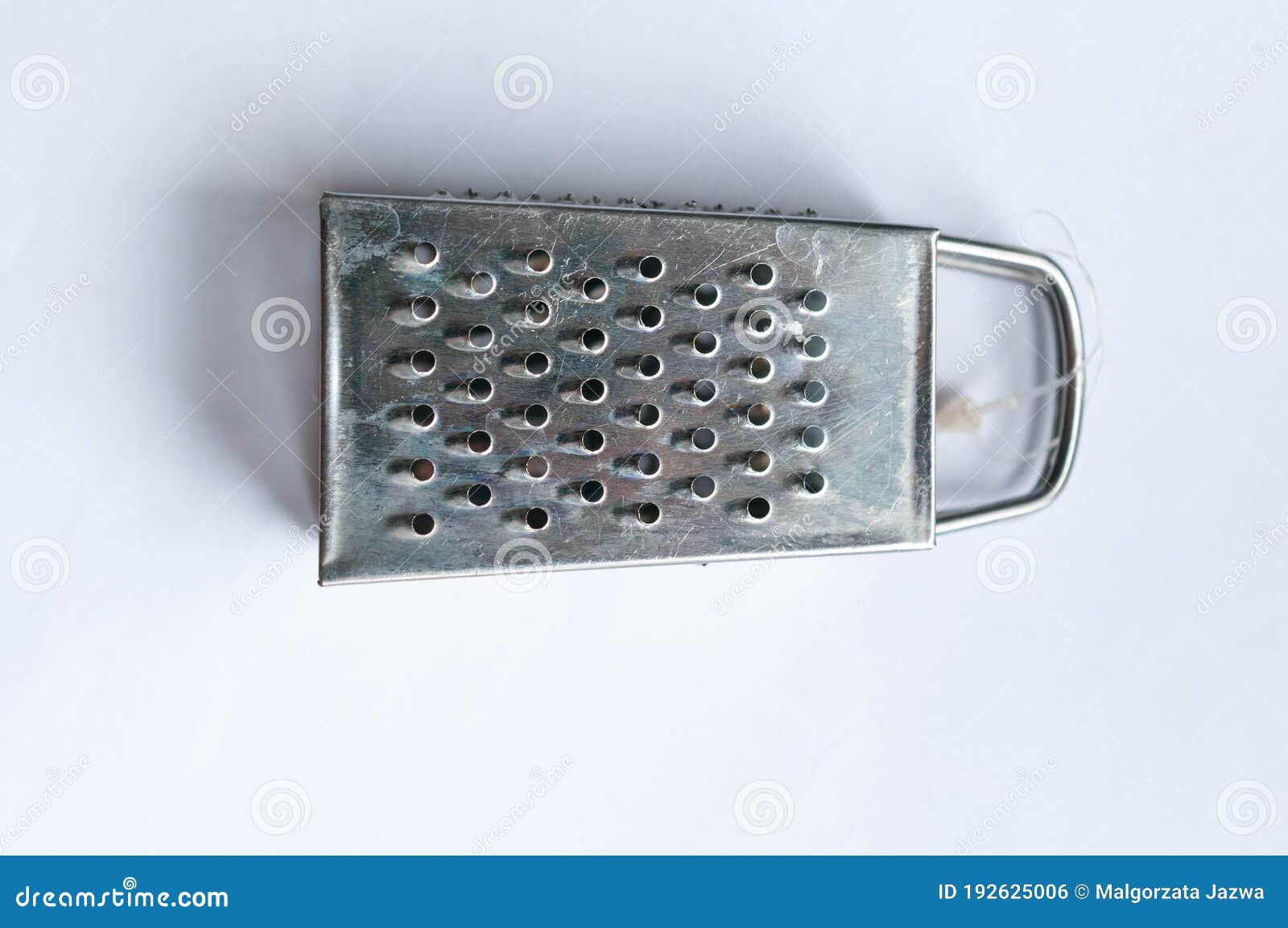 Tiny Grater for Food on a White Background, Kitchen Tools Stock Photo