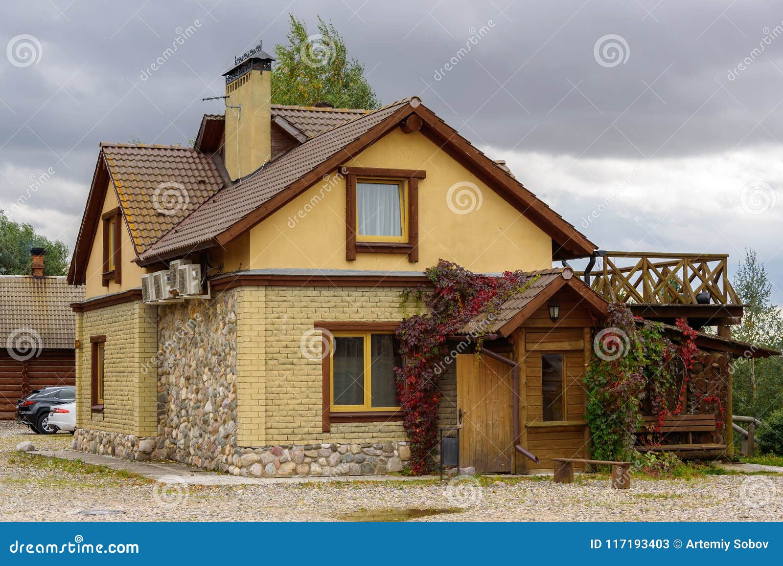 A Small iModerni iHousei Made Of Yellow Brick And Stone Stock 