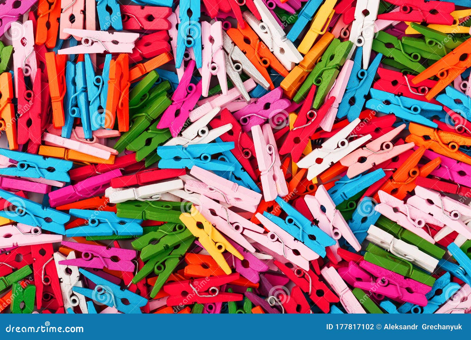 Small Multicolored Clothespins As a Fullscreen Texture and Background