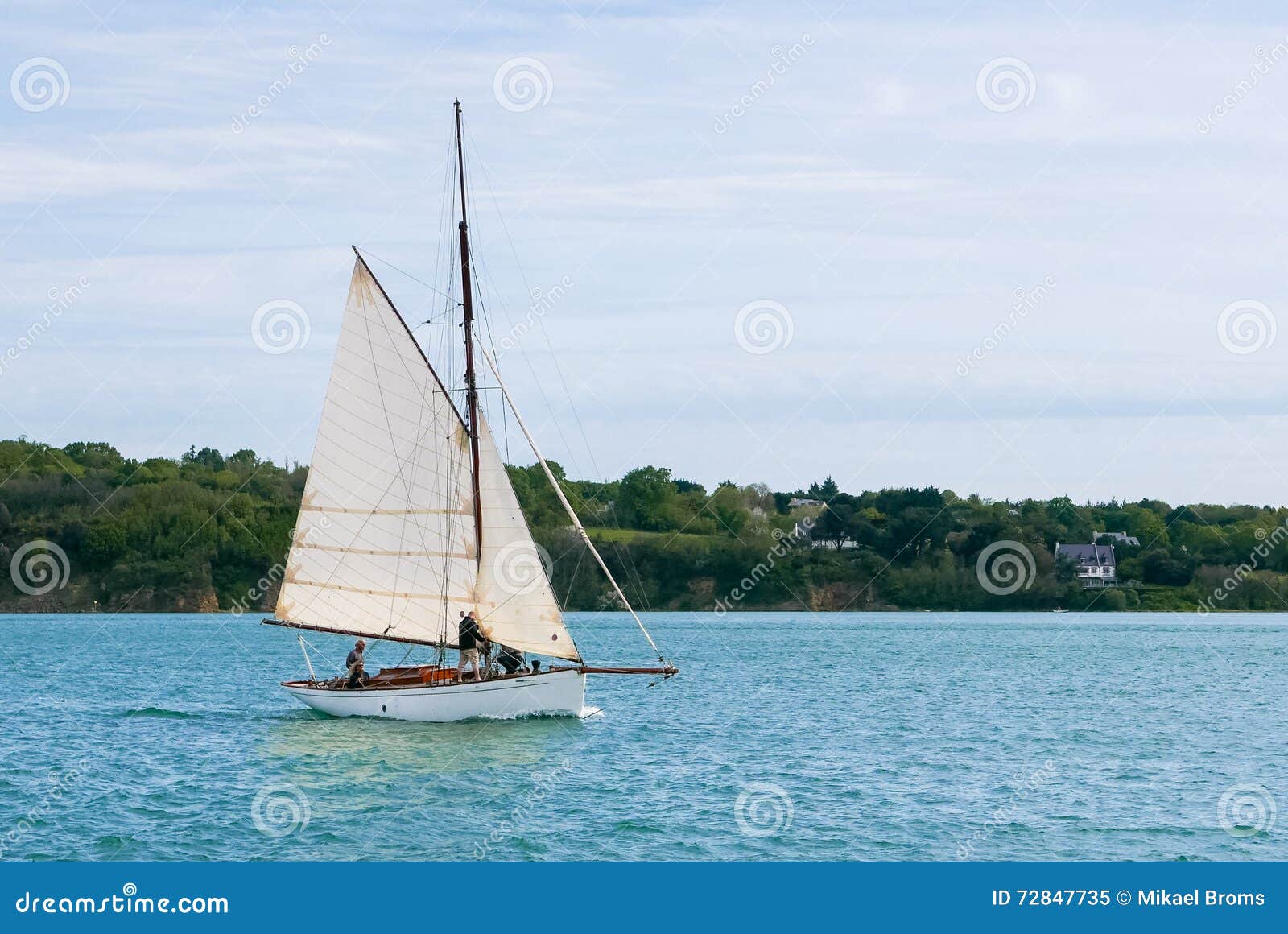 small old gaff rig sailboat