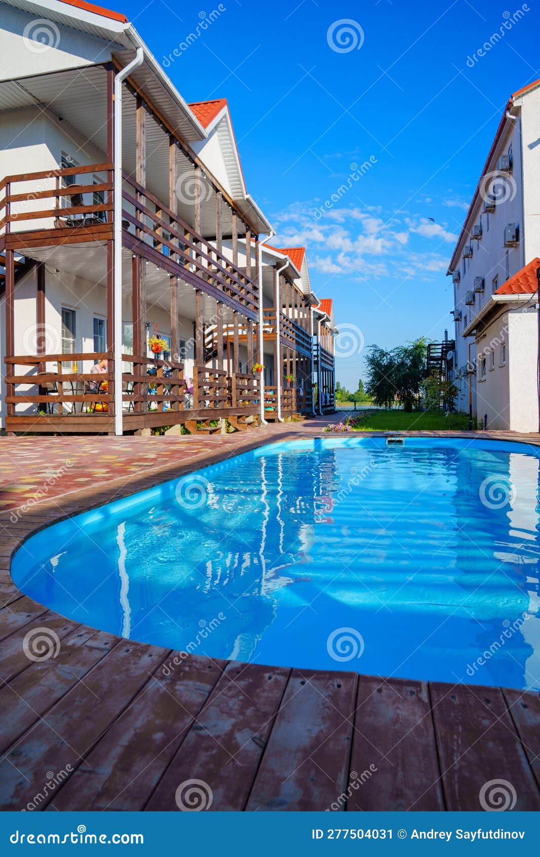 a small outdoor pool in hotel with limited space.
