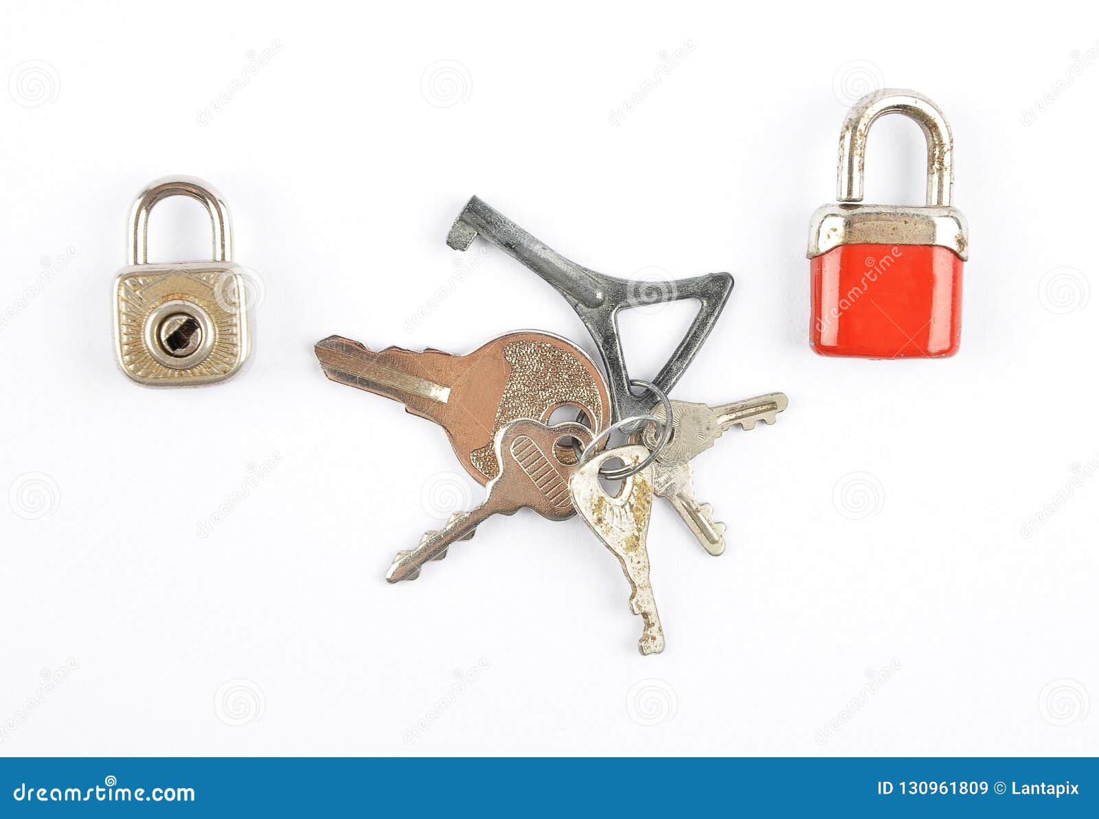 Small Padlocks and Bunch of Keys on White Background Stock Image