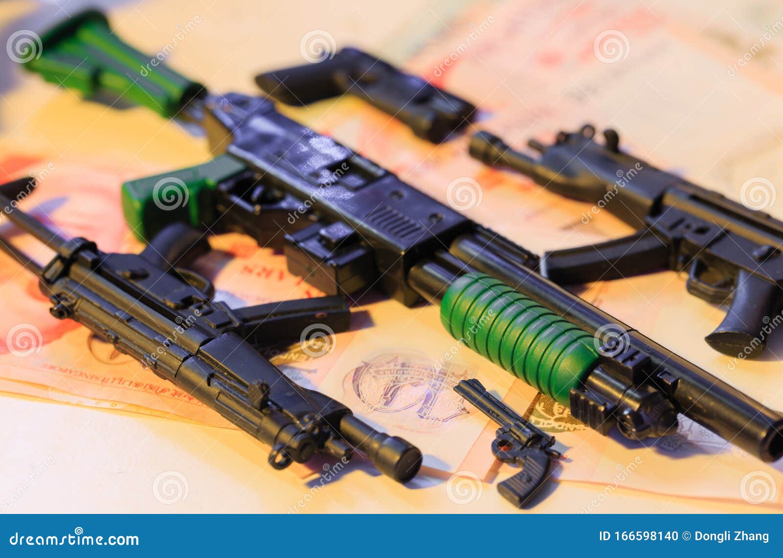 Small Plastic Toy Guns Display on Table Closeup Stock Photo Image of