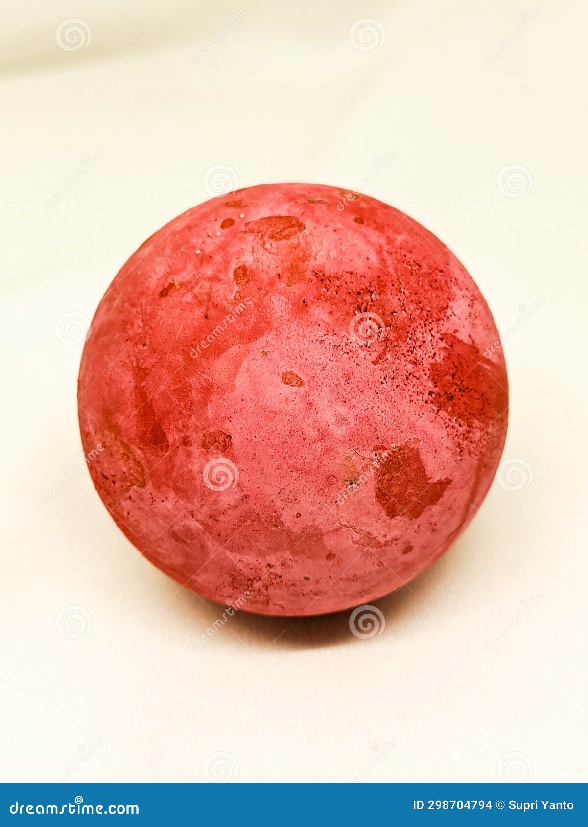 A Small Red Rubber Ball on a White Background Stock Photo Image of
