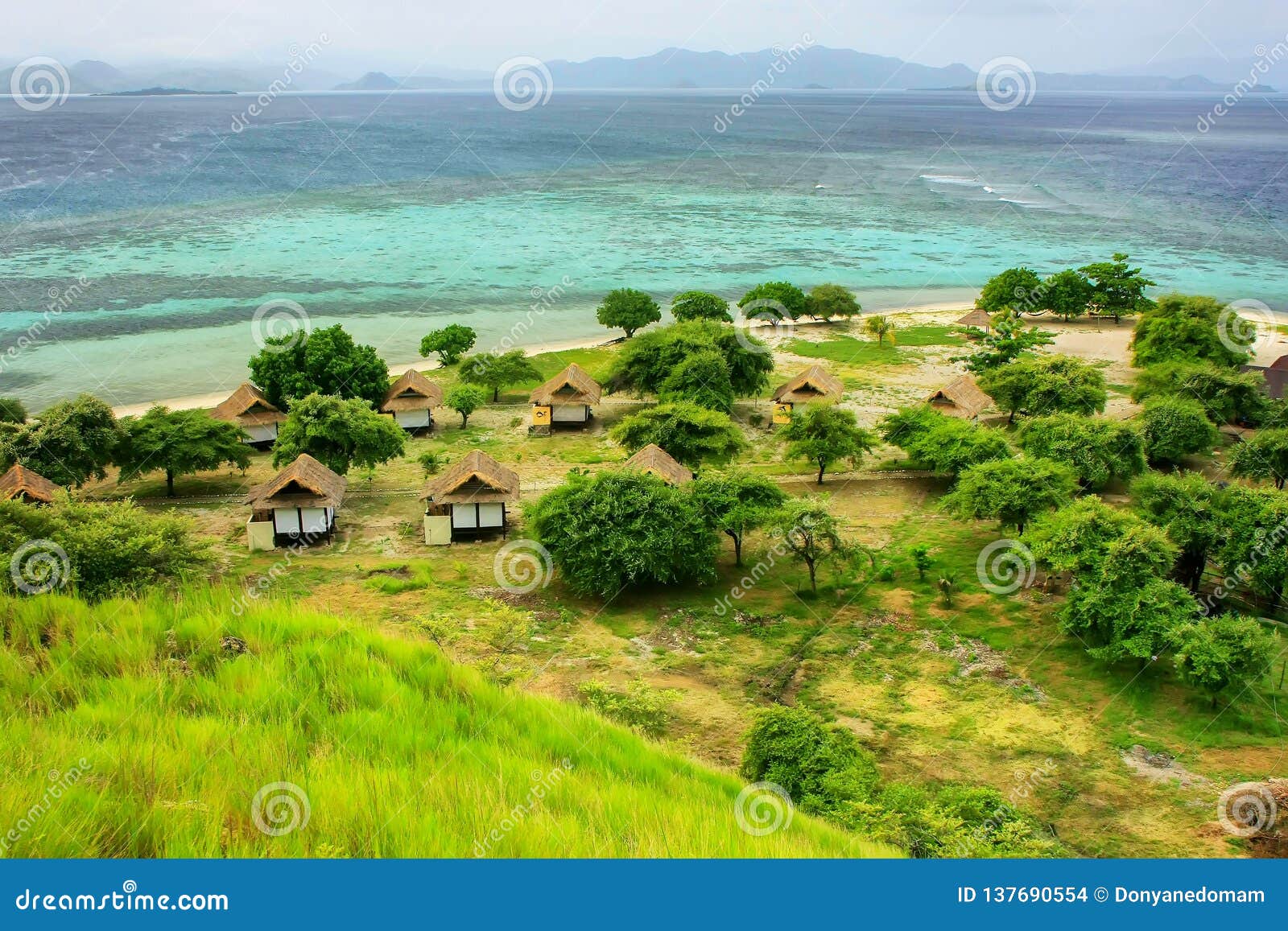 small resort on kanawa island in flores sea, nusa tenggara, indonesia