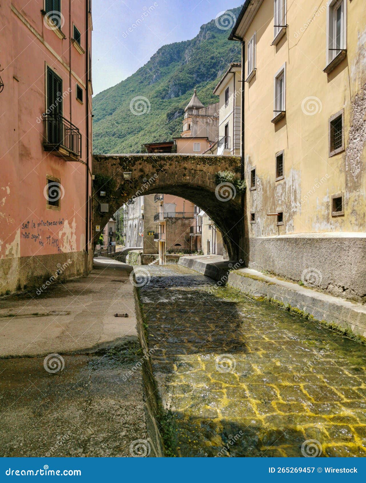 small river crossing the town of campagna in salerno province, campania region, italy.