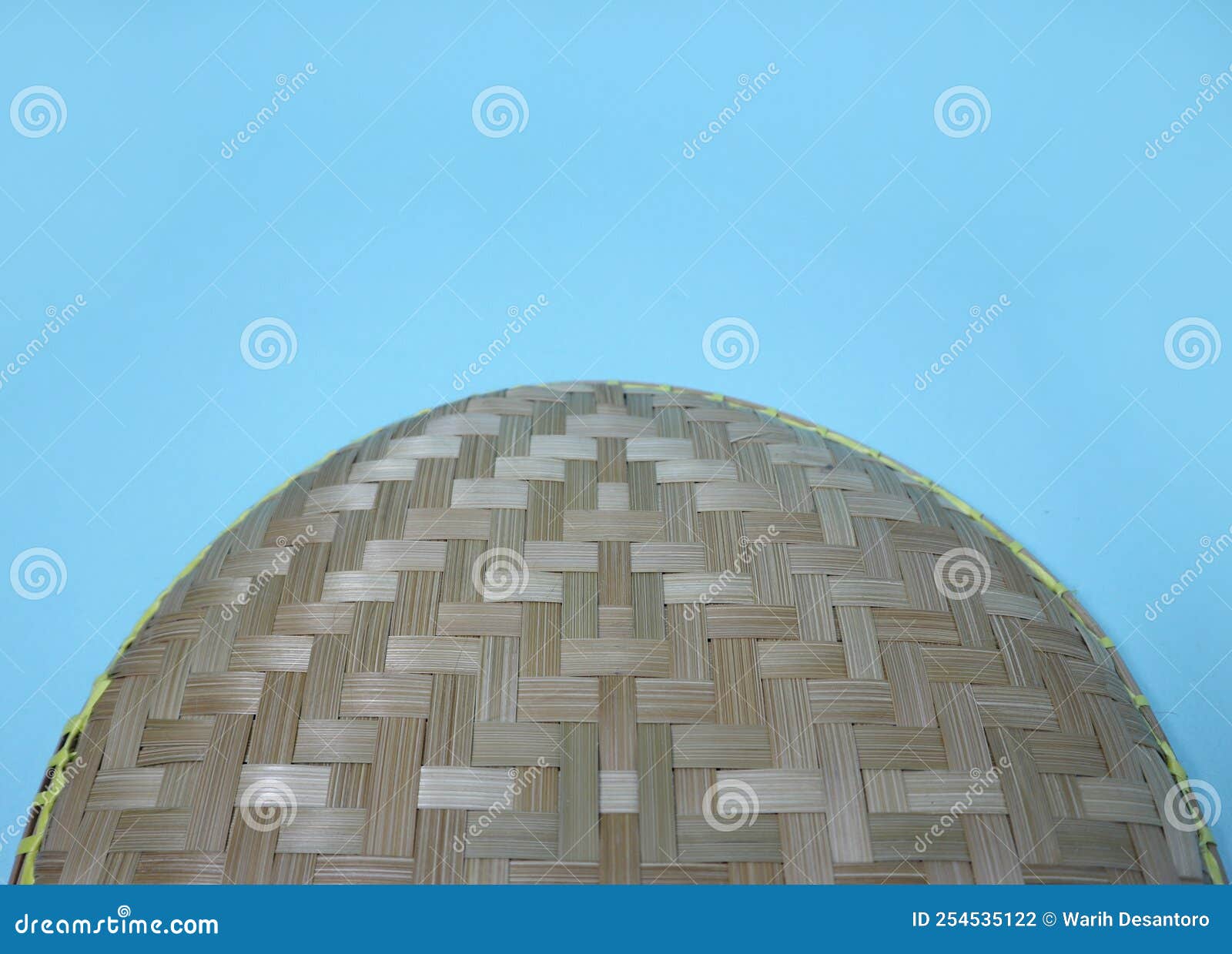 A Small Round Bamboo Wall Art or Tampah Bambu, a Typical Indonesian