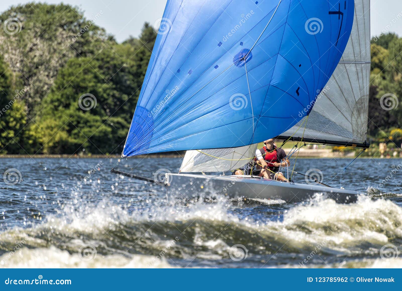 a sailboat on a lake sails 40