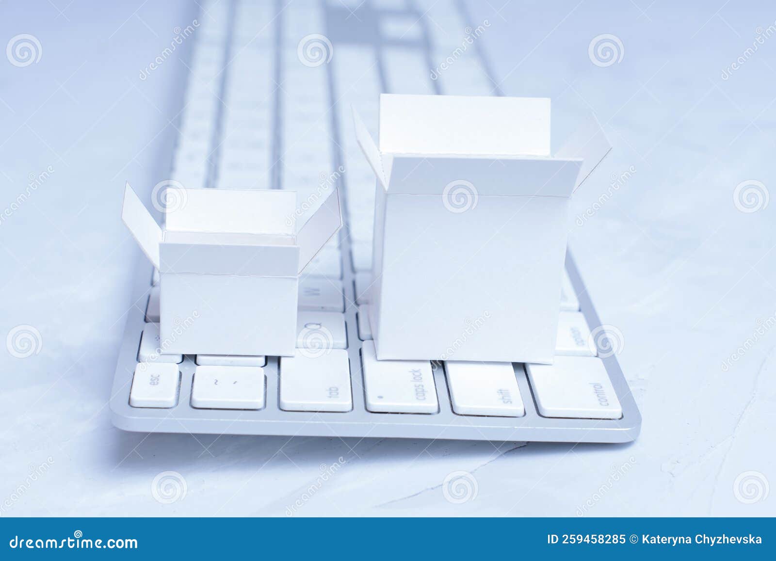 Small Shipping Boxes Placed on a Keyboard Stock Image Image of cargo