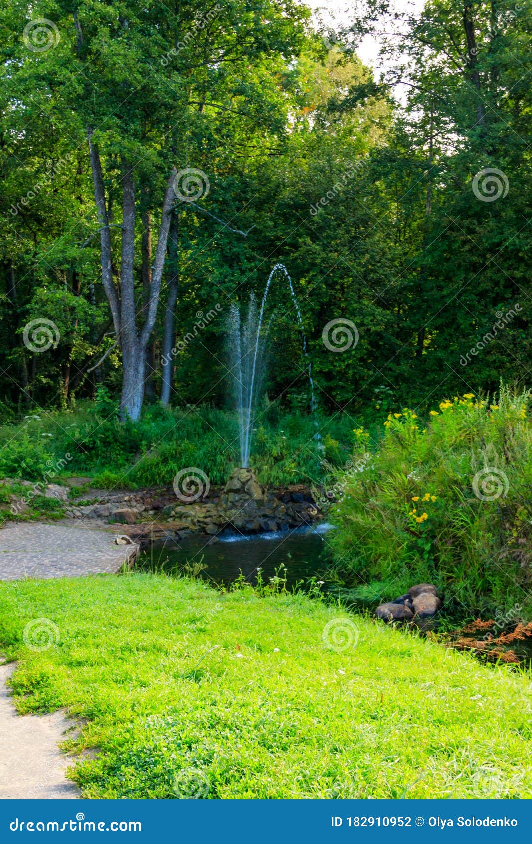 Simple Fountain Flowing With Clear Mountain Water RoyaltyFree Stock