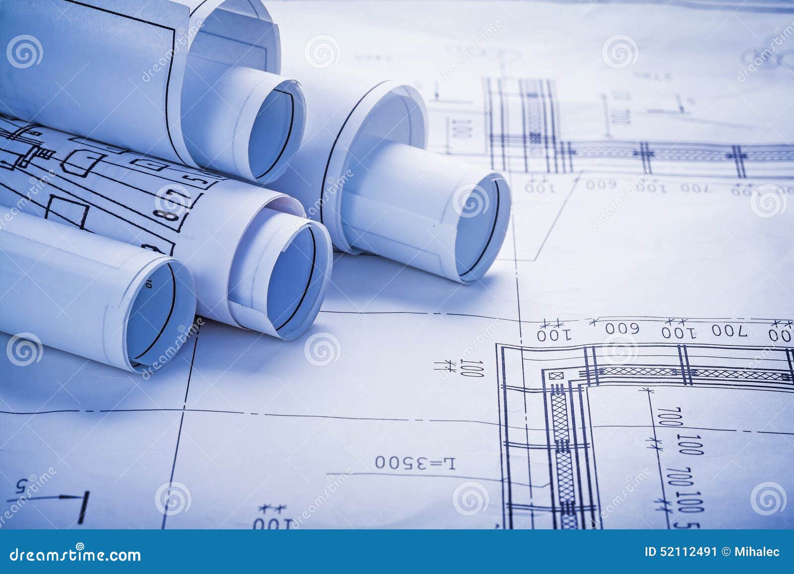 Small Stack Of White Rolled Up Blueprints Stock Image 