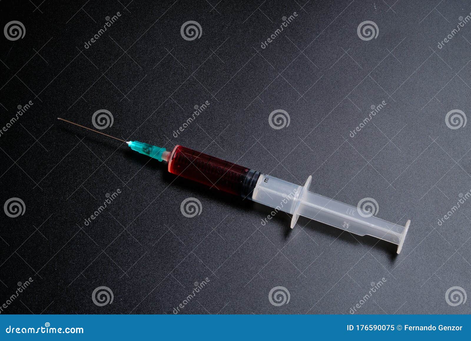 A Small Syringe into Which a Hollow, Sharppointed Bevelcut Needle is