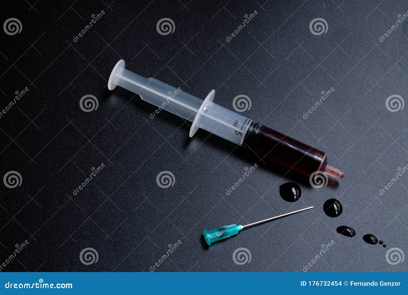 A Small Syringe into Which a Hollow, Sharppointed Bevelcut Needle is