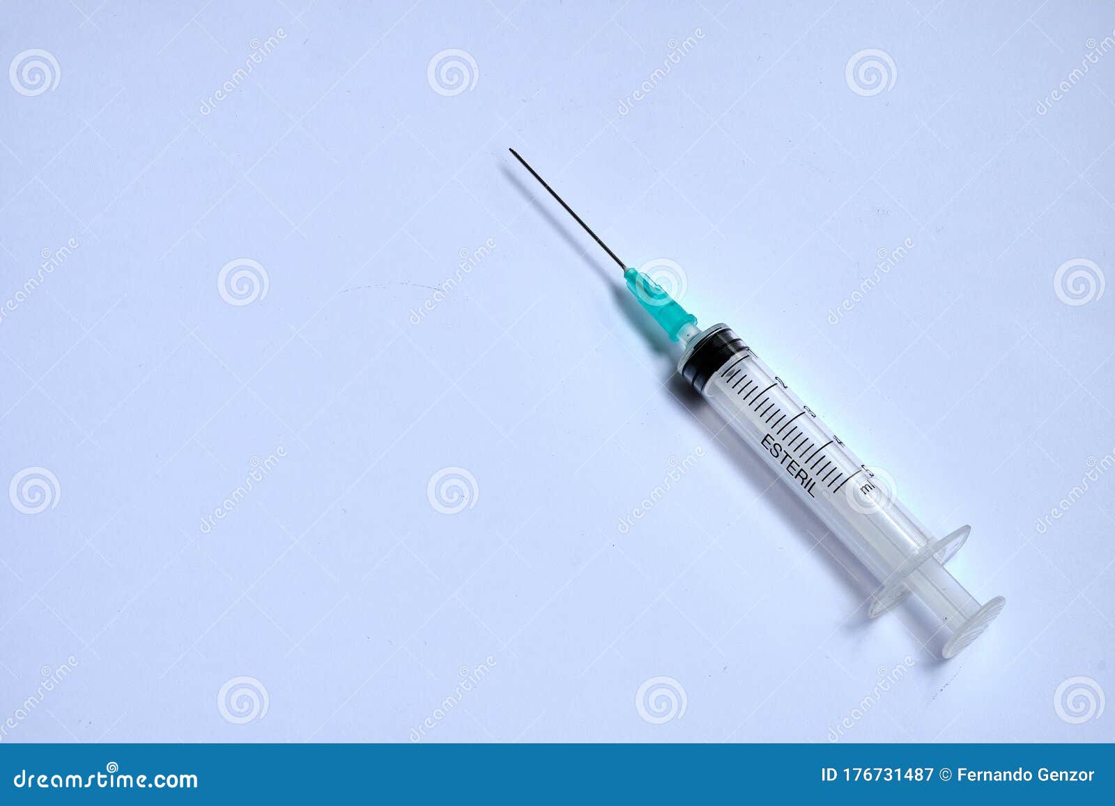 A Small Syringe into Which a Hollow, Sharppointed Bevelcut Needle is