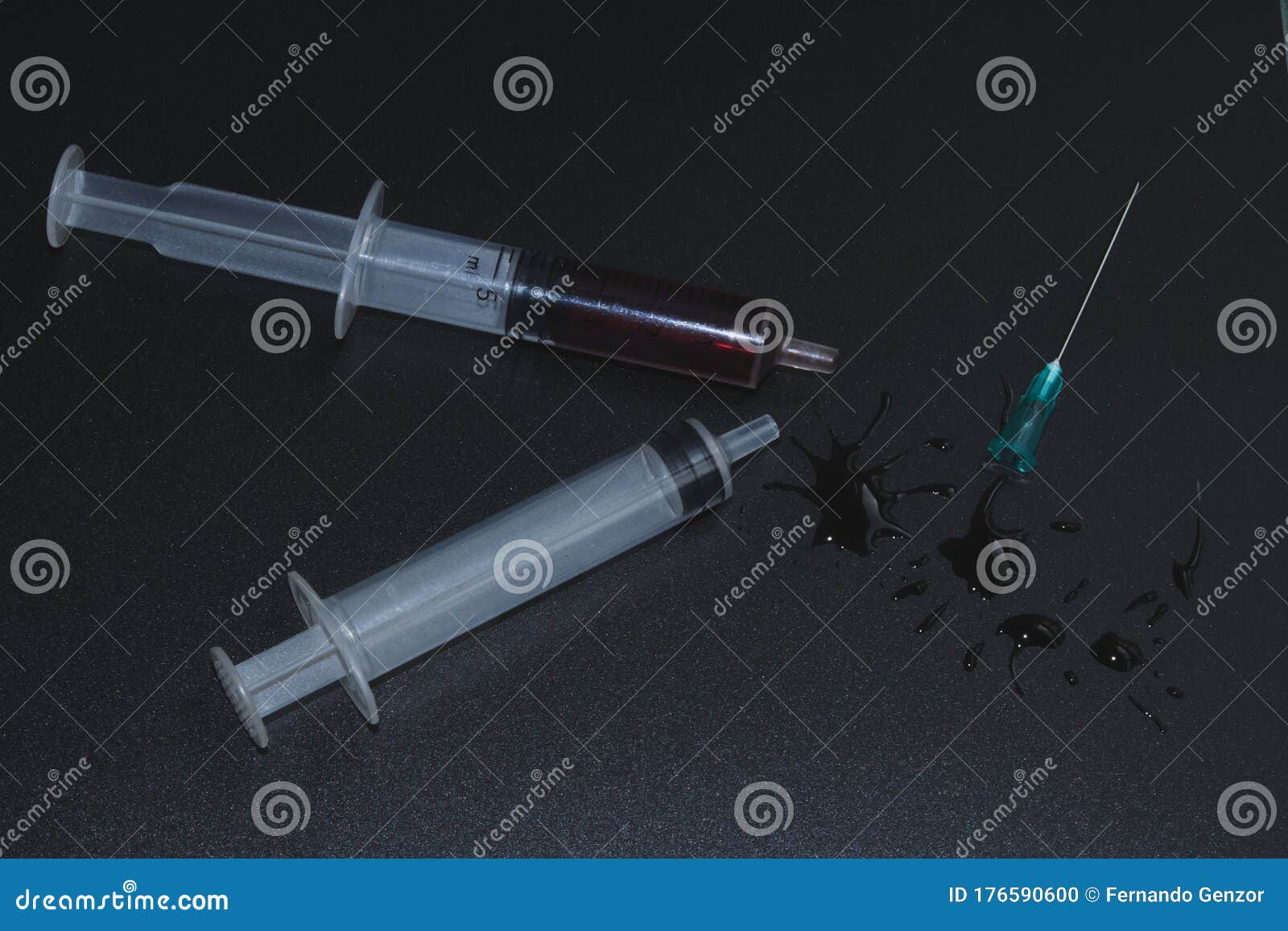 A Small Syringe into Which a Hollow, Sharppointed Bevelcut Needle is