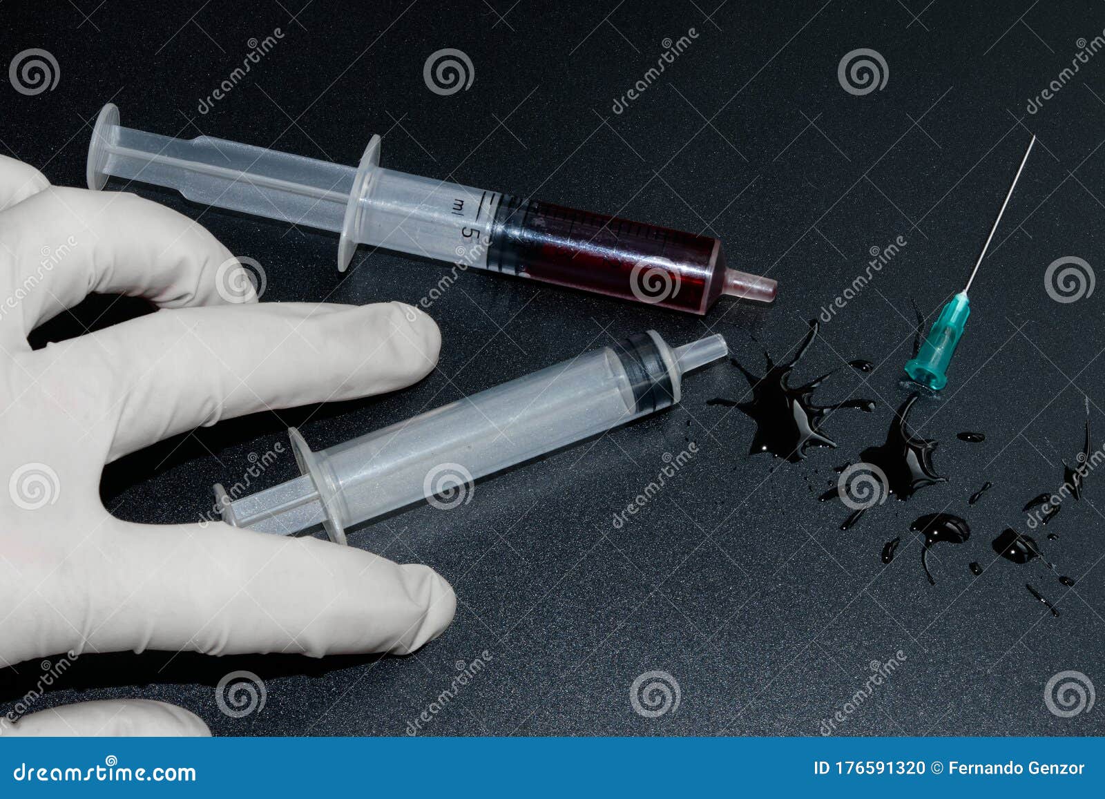 A Small Syringe into Which a Hollow, Sharppointed Bevelcut Needle is