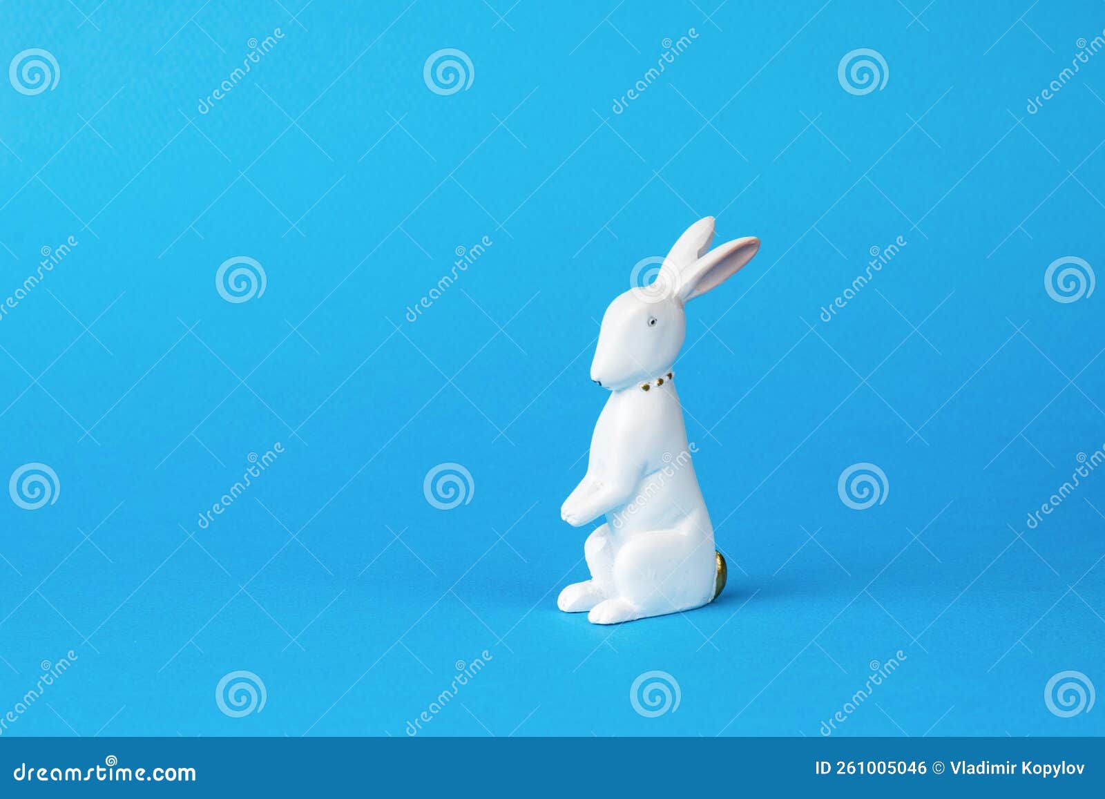 A Small Toy Bunny on a Blue Background Stock Photo Image of creature